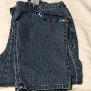 Ruby Ad size 10 with elastic on the sides boot cut has beads on the pocket jeans